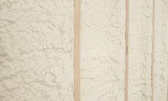 Close-up view of foam insulation panels with textured surface.