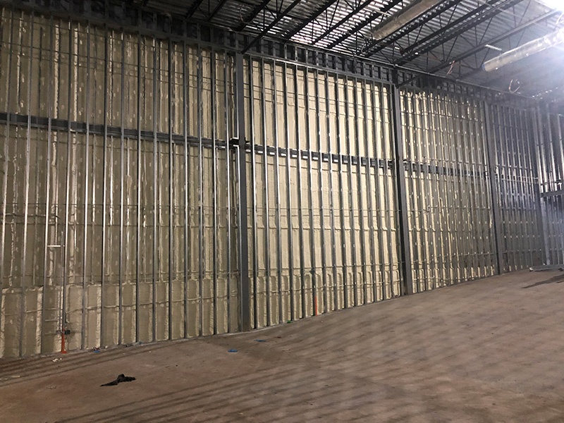 Spray foam insulation project at a movie theater