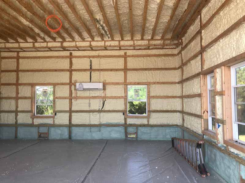 Interior walls and roof deck insulated with spray foam in a new home build.