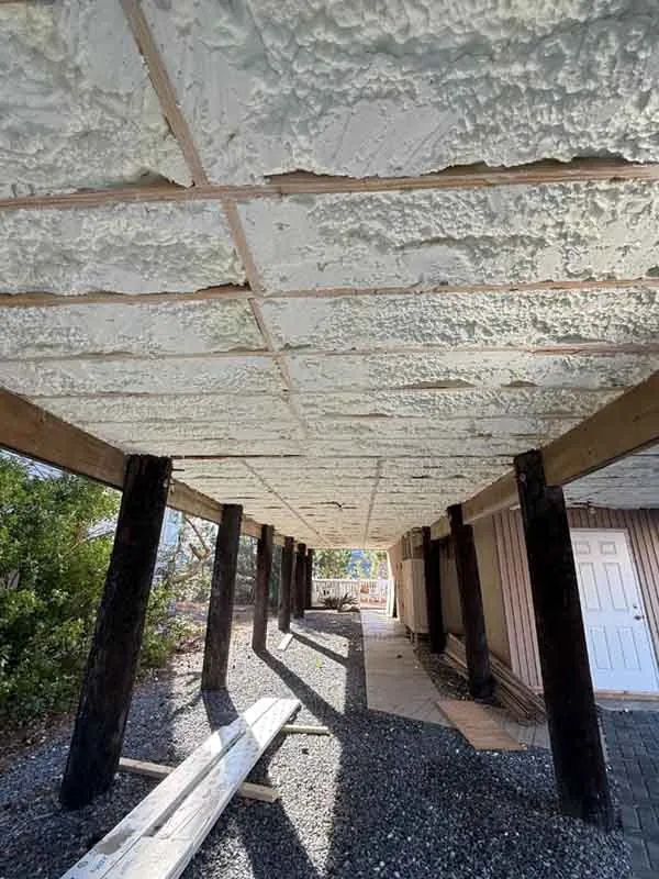 Under deck open cell spray foam.